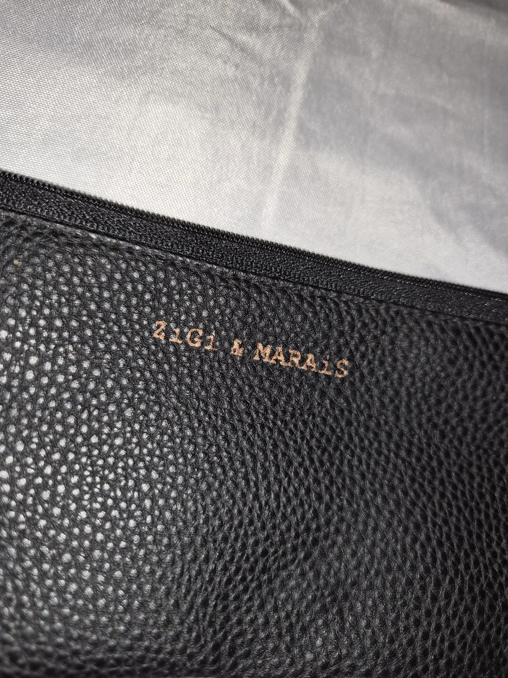 Black Pebbled Leather Tassel Cosmetic Pouch